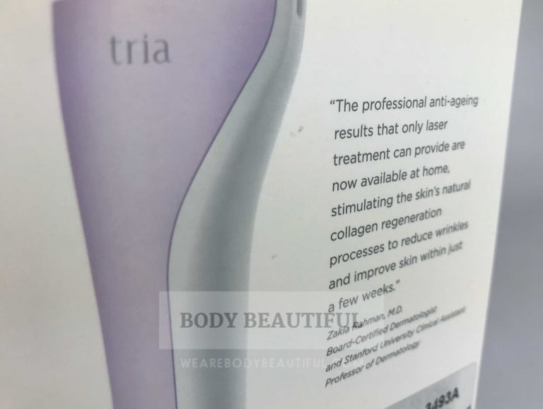 Close up photo of the dermatologist quote on the outside of the Tria age defying laser box. This testimonial reads: "the professional anti-ageing results that only laser treatment can provide are now available at home, stimulating the skin's natural collagen regeneration processes to reduce wrinkles and improve skin within just a few weeks" Zakia Rahman, M.D., Board Certified Dermatologist and Stanford University Clinical Assistant Professor of Dermatology