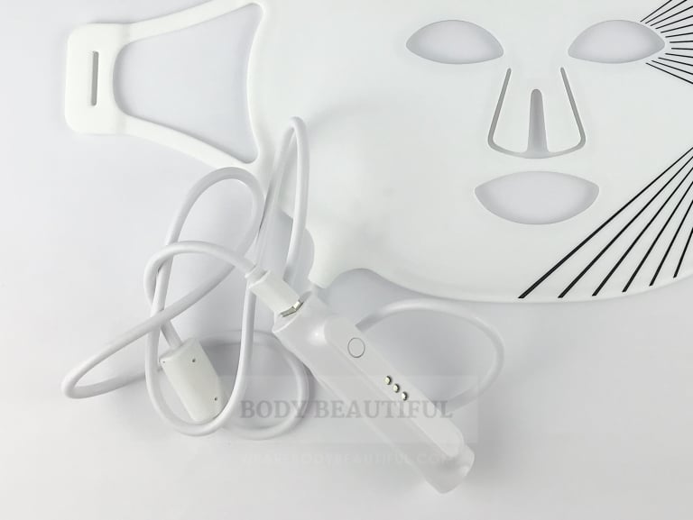 The CurrentBody.com Skin LED light therapy mask connected to the small battery powered controller.