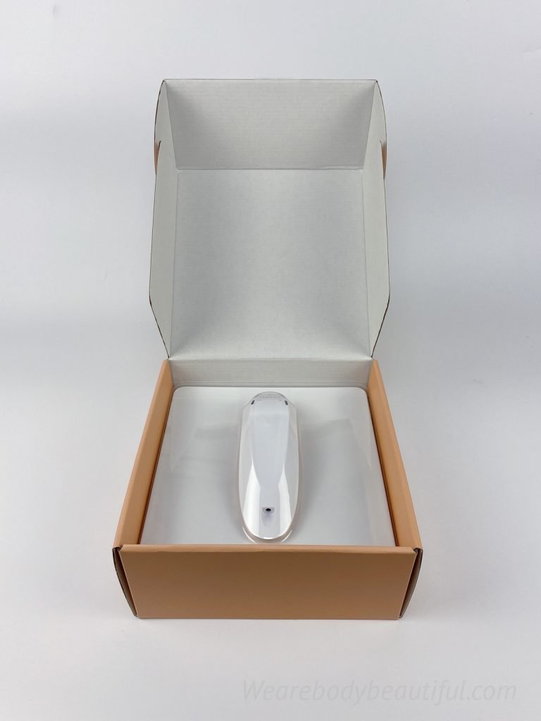 Lift the lid on the box to see the Sensilift device secured in a white moulded plastic bed with clear plastic cover.