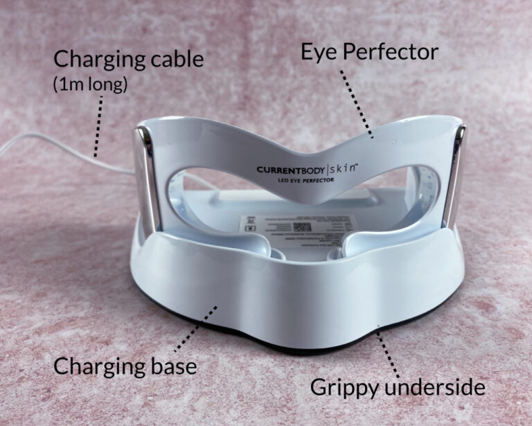 The charging cable for the Eye Perfector is 1m long and connects to the back of the charging base. The Eye Perfector sits snug and secure in the charging base, and the charging base has a grippy base to keep it all in place.