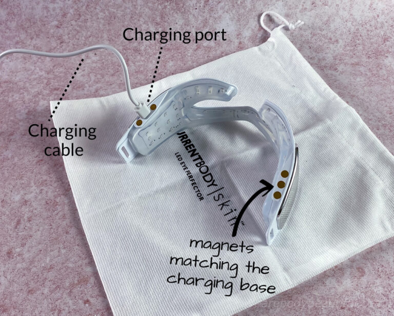 The USB charging cable fits in the charging port on the right-hand underside of the Eye Perfector mask. There are also small circular magnets on both undersides which connect with the charging base.