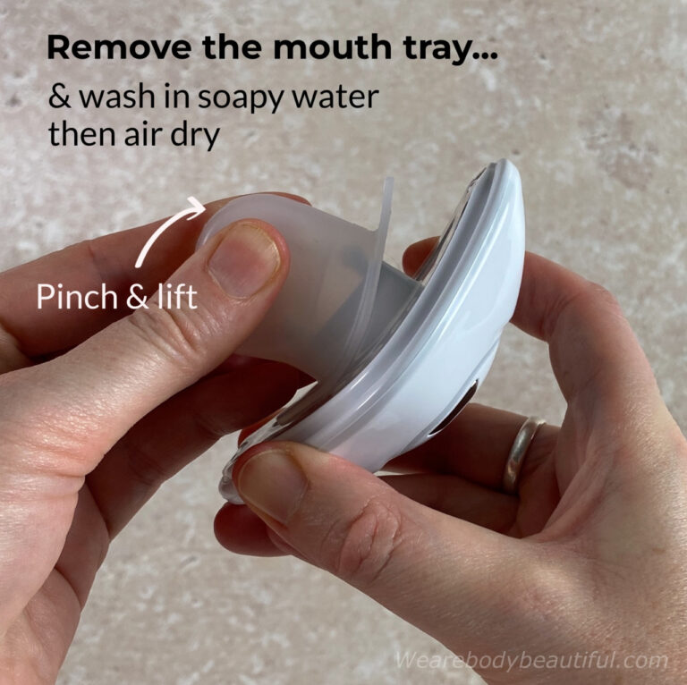 Pinch & lift the silicine mouthtray to remove and wash it in sopay water.