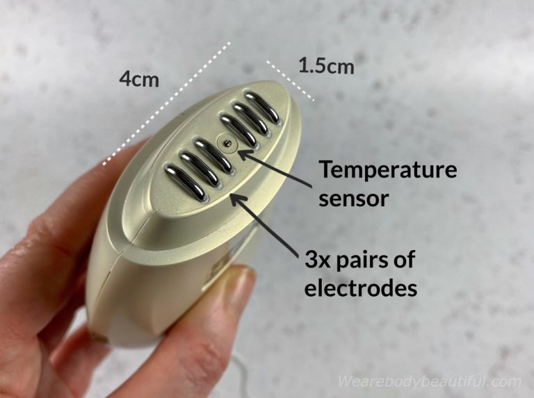 The 4 cm long and 1.5 cm wide treatment head of the NEWA device has 3 pairs of RF electrodes that look like a line of adjacent thick staples with a small nobble in the middle, which is the skin temperature sensor.