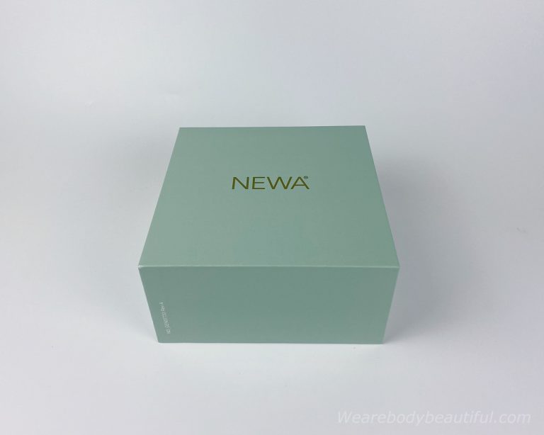Slide off the info sleeve and see the NEWA branded neat and green box below.