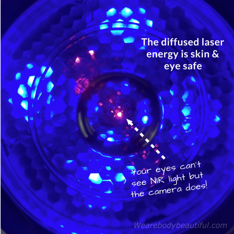 The lens diffuses the laser energy so it’s skin and eye safe. Our eyes can’t see the NIR laser beam, but the camera picks it up in this photo.