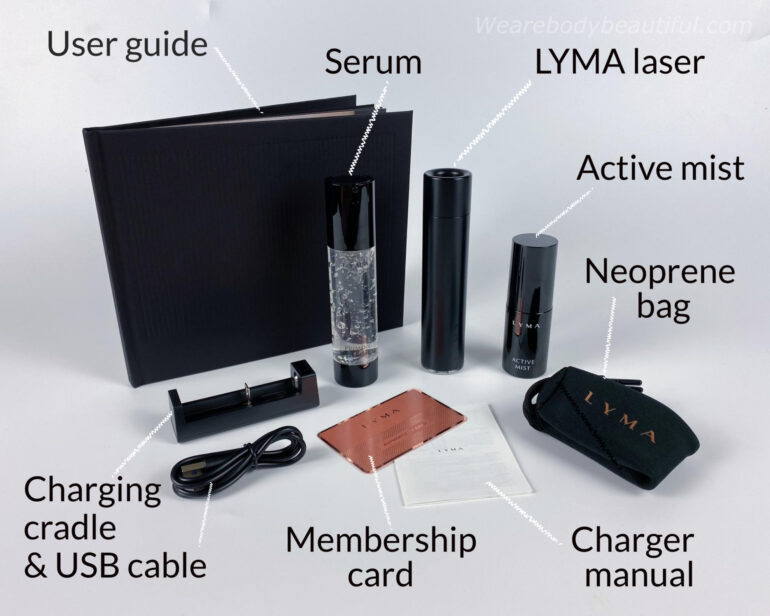 The contents of the Tripollar VX home RF kit laying in a floofy cream throw: the STOP VX device, 50 ml prep gel, user guide, 2m mains cable, UK, EU and US plugs.