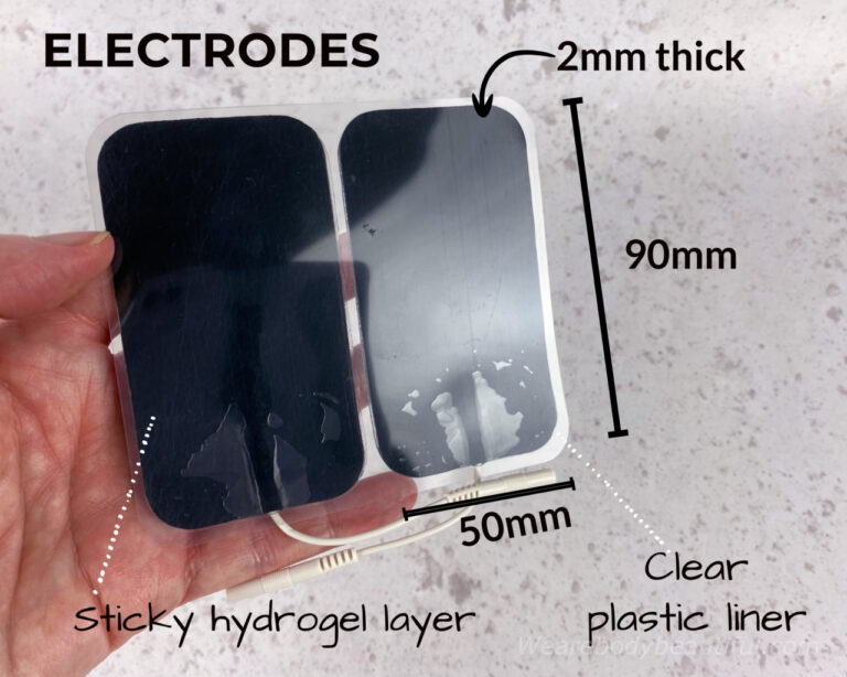 The conductive side of the electrodes is a grey, sticky hydrogel layer stuck to a clear plastic liner. The electrodes measure 50mm by 90mm, and are 2mm thick.