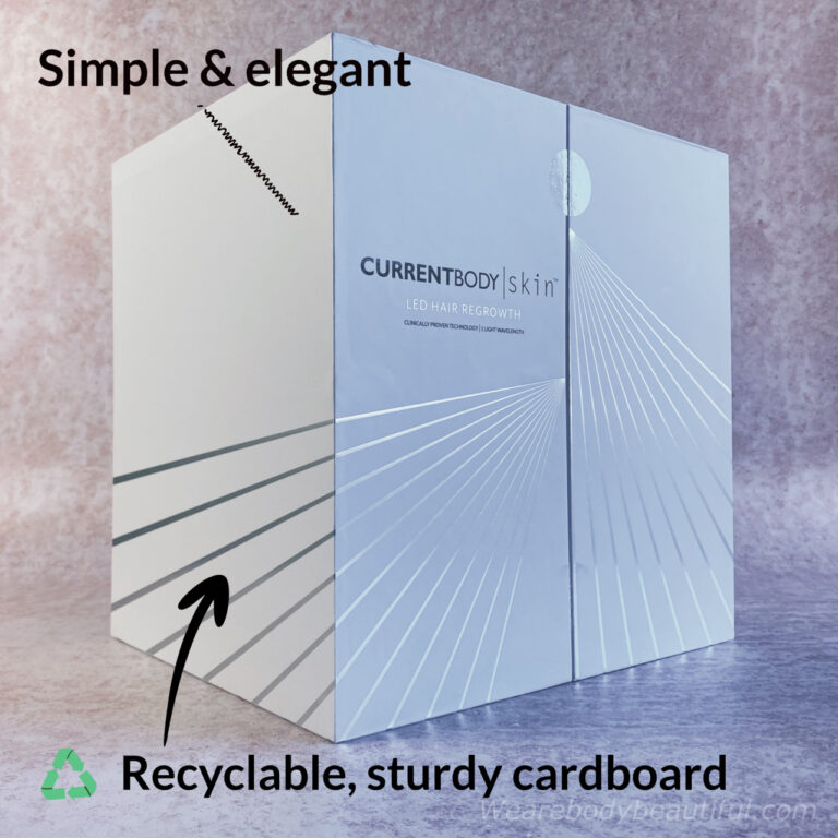 The CurrentBody Skin LED hair regrowth device comes in a large, sturdy, white recyclable cardboard box. I like the simple elegance with black and silver design accents.