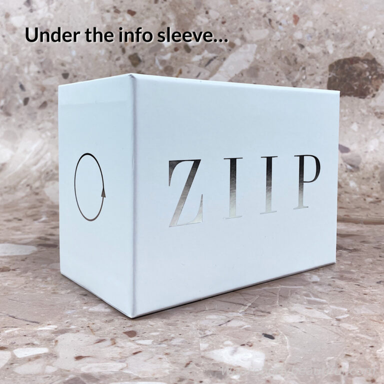 Under the ZIIP info sleeve is a simple, sturdy, white slide off lid, cardboard box with silver ZIIP branding on the sides.