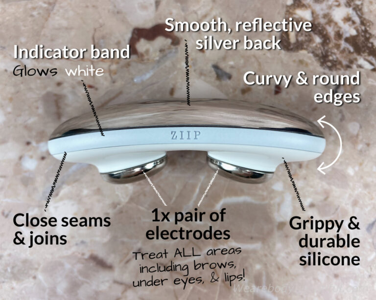 This side view of the ZIIP HALO device shows the rounded smooth reflective silver back, which is edged with a 0.5cm wide grey/white band with a ZIIP logo front and back. This band glows white when you use the HALO. On the underside are two round silver electrodes surrounded by a white, grippy silicone. It’s a robust, durable and wipe-clean construction. You can use the electrodes to treat all facial areas, including your eyebrow, under eye and lip area - no extra cash for additional attachments!