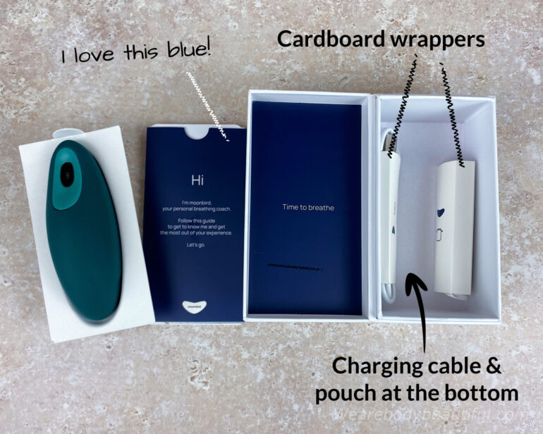 Under the Moonbird you’ll find the charging cable and soft protective pouch in cardboard wrappers.