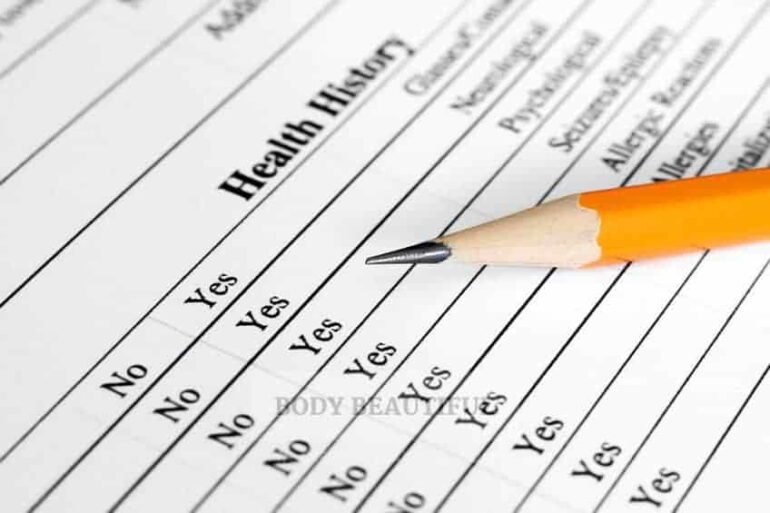 Close up of a sharp yellow pencil  on top of a heilth history questionnaire.