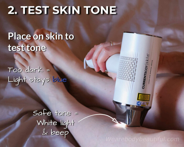 2. Test your skin tone; place the laser aperture on your treatment area. You’ll hear a beep and see a white light if your skin tone is safe. If it’s too dark, the light stays blue, there’s no beep from the laser, and you can’t unlock it.