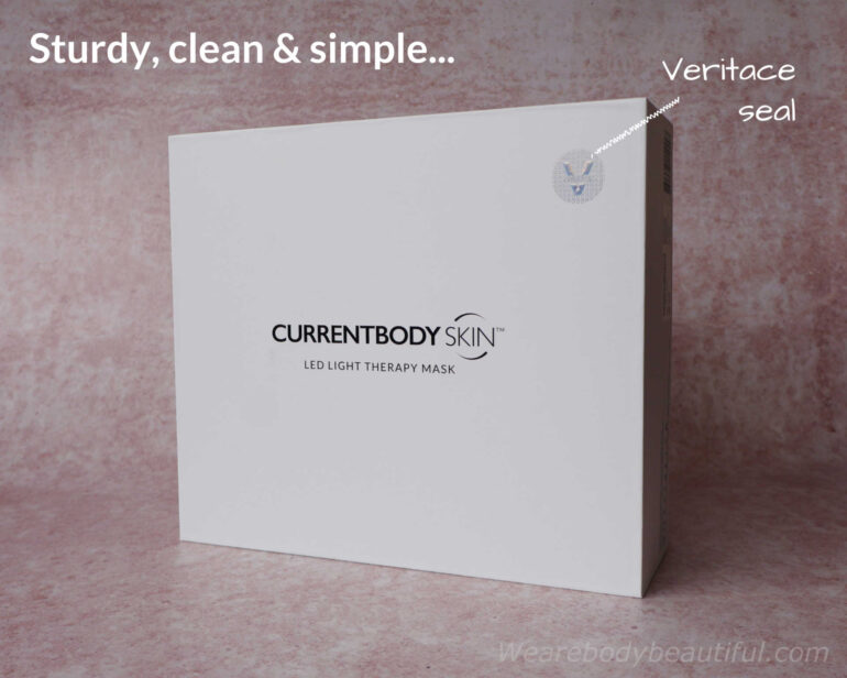 The CurrentBody Skin LED Light Therapy Face Mask: Series 2 white cardboard box is sturdy and clean with simple black branding and an iridescent Veritace® logo on the front.